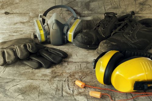 various types of ppe personal protective equipment: gloves, shoes, ear protection