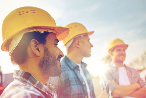 workers listen to safety consultant