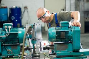 man running light machinery
