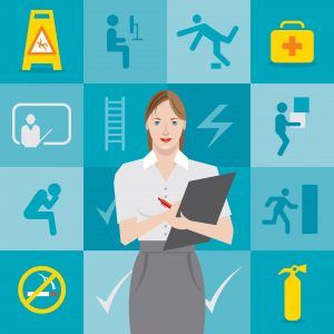 A workplace safety inspector with a first aid checklist