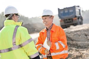 workers in PPE at job site