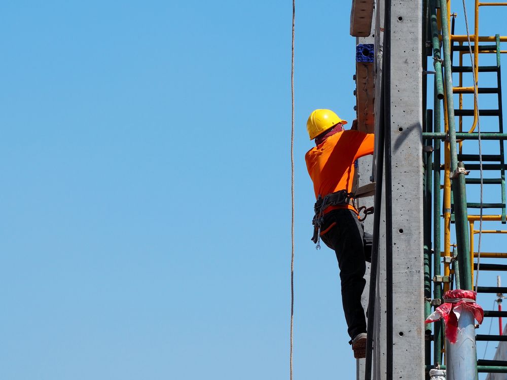 working at heights on new building construction site