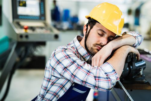 poor sleep has worker tired and asleep on job