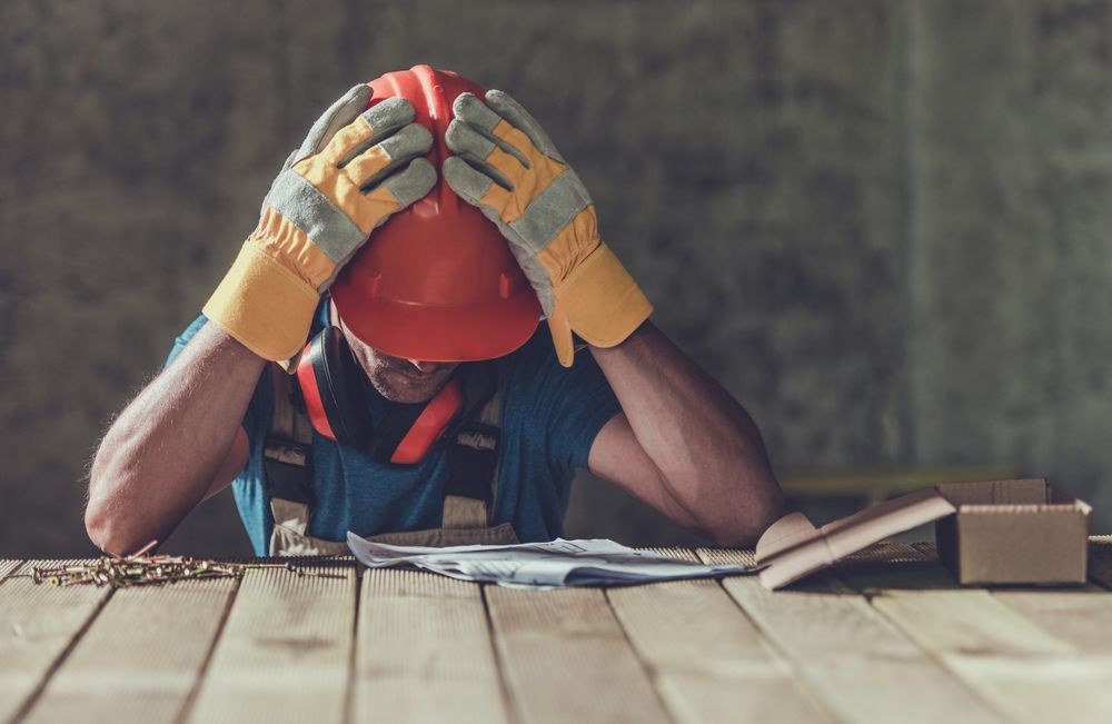 bored construction worker being complacent on the job