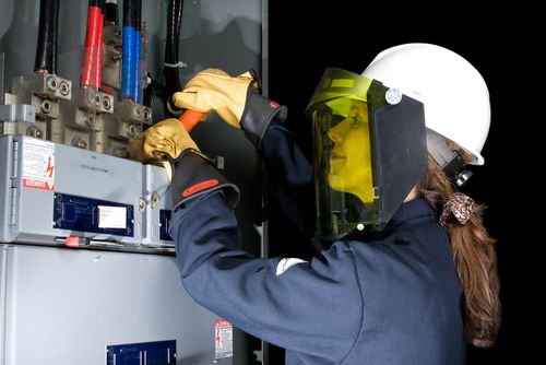 Female,Electrician,With,Protective,Clothing,Performing,Work,In,An,Energized - Arc Flash Safety Training