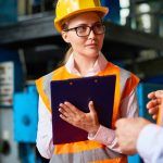 workplace safety inspector meets with supervisors
