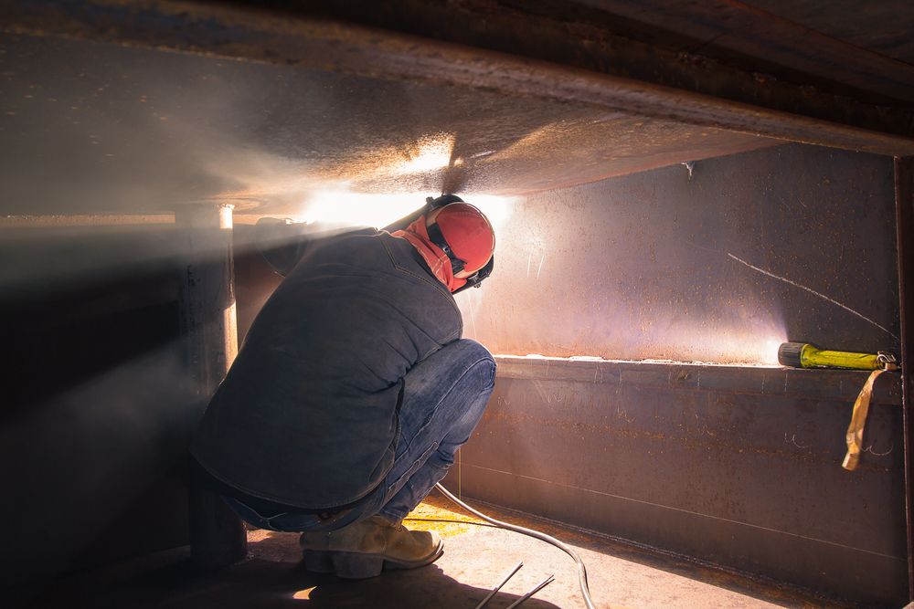 worker trained in confined space entry