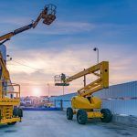 scissor lifts parked outside