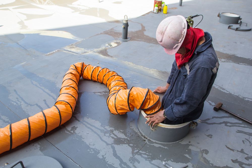 worker entering confined space