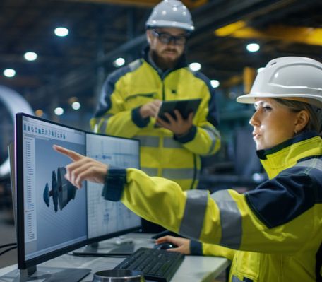 workers reviewing safety protocols