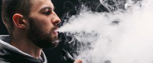young man vaping