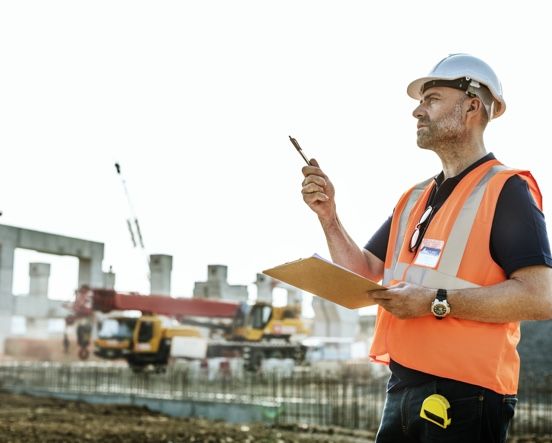 why-choose-act construction worker going over safety precautions