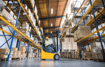 man operating forklift