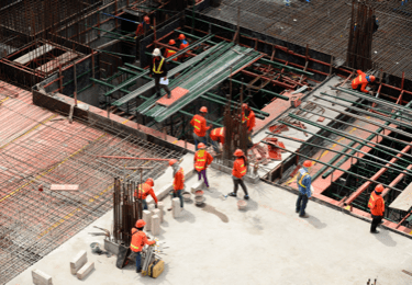 construction workers on a high rise building under construction