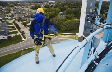 man working safely up high